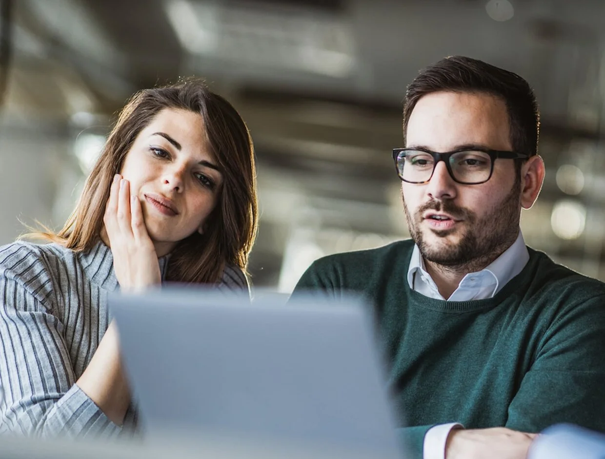 Advisors discussing financing options with a business client